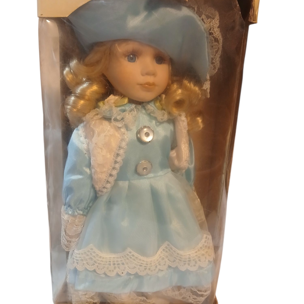 Blue and White Vintage Doll with Lace Accessories